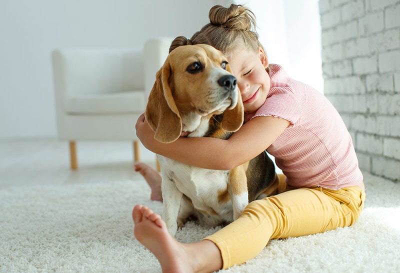 Girl with pet dog