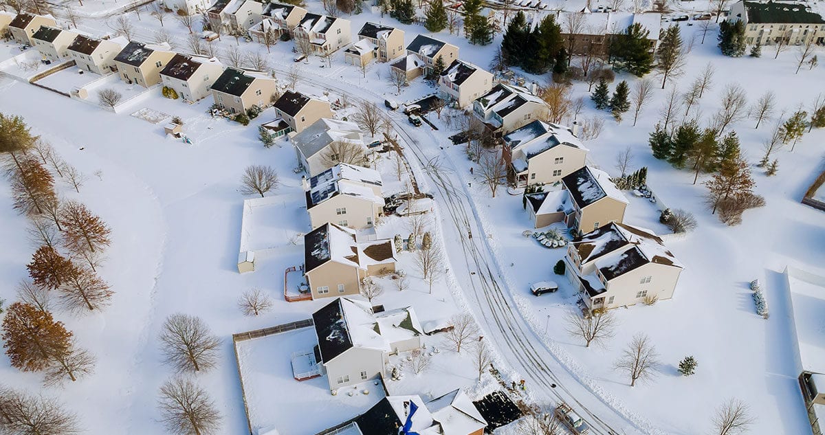 Winter snow covering neighborhood